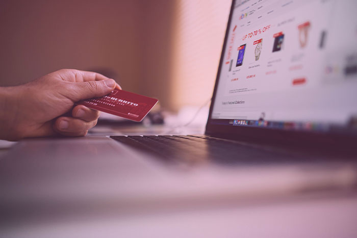 Image of someone making an online purchase.